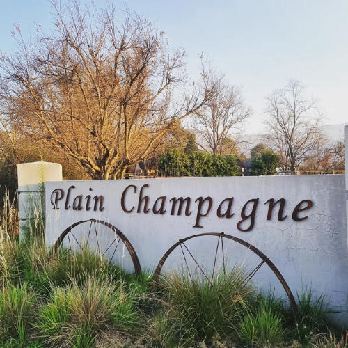 Gate sign at the entrance to Plain Champagne Gust Farm